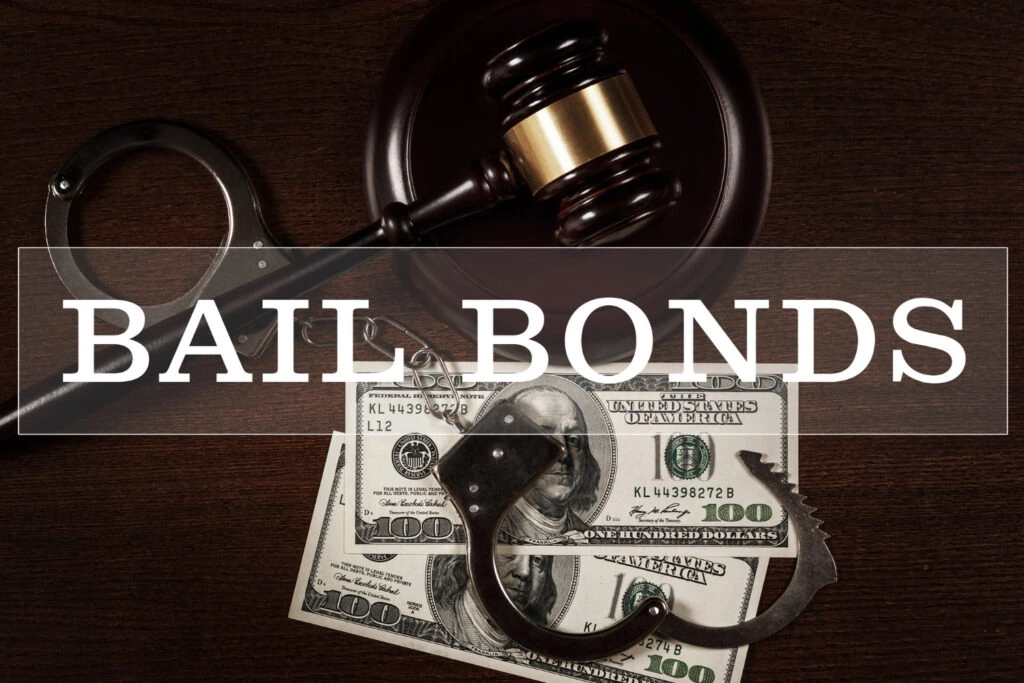 a gavel and handcuffs on money - what is a bail bond?